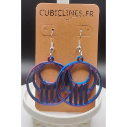 Ajoutez une touche de modernité sculpturale à votre style ! Ces boucles d'oreilles pendantes, fabriquées grâce à la technologie