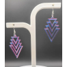 Affirmez votre style avec ces boucles d'oreilles pendantes au design géométrique unique et résolument moderne !