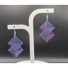 Donnez une touche avant-gardiste à votre style avec nos boucles d'oreilles Matrix. Inspiré des lignes épurées de l'Art Déco et d