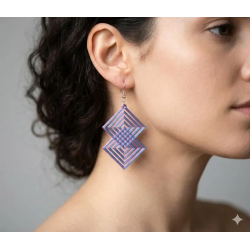 Donnez une touche avant-gardiste à votre style avec nos boucles d'oreilles Matrix. Inspiré des lignes épurées de l'Art Déco et d