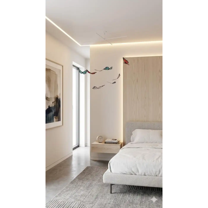 Ajoutez une brise de poésie, de couleur et de sérénité à votre intérieur avec ce mobile décoratif de papillons. Entièrement pens